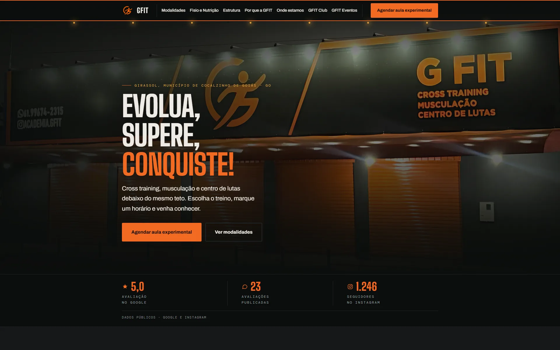 Página inicial do site da GFIT: fundo escuro com detalhes em laranja e foto noturna da fachada da academia, o título 'Evolua, supere, conquiste!' e um menu com Modalidades, Estrutura e Onde estamos.